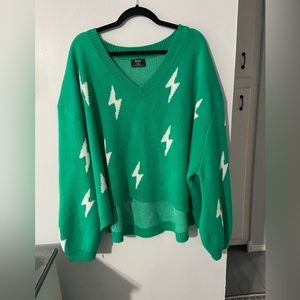 Dressed in LALA lighting bolt cropped sweater